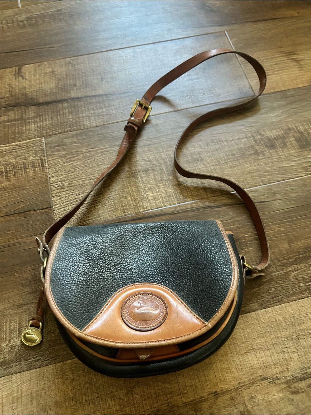 Dooney & Bourke Black Pebbled Leather Crossbody with Brown Trim